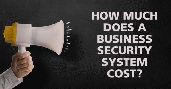 How much does a business security system cost? Text displayed on a chalkboard background with a megaphone, representing a pricing guide for business security systems.