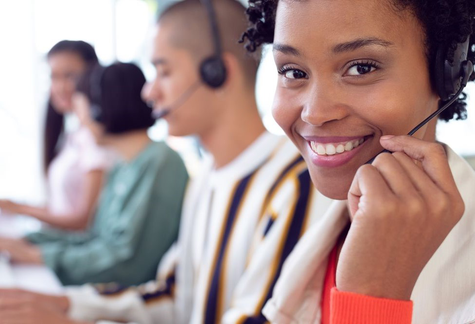 Person speaking to a customer on their headset