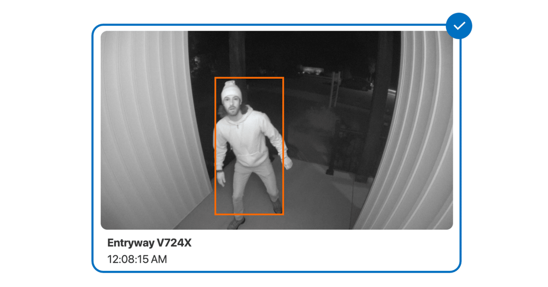 Black-and-white security camera footage showing an intruder in a hoodie highlighted by a detection box. The camera displays the location 'Entryway V724X' and timestamp '12:08:15 AM,' illustrating how video verification works to confirm emergencies.