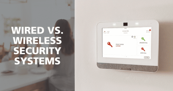 A modern home security panel displaying locked door status, with text overlay reading "Wired vs. Wireless Security Systems.